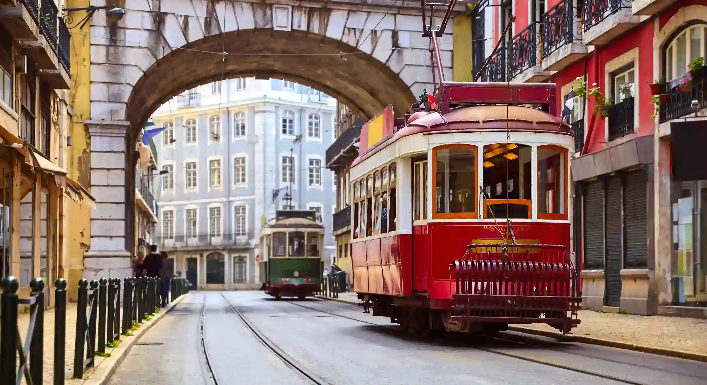 Vintage tram Alfama district Lisbon — old town neighbourhood