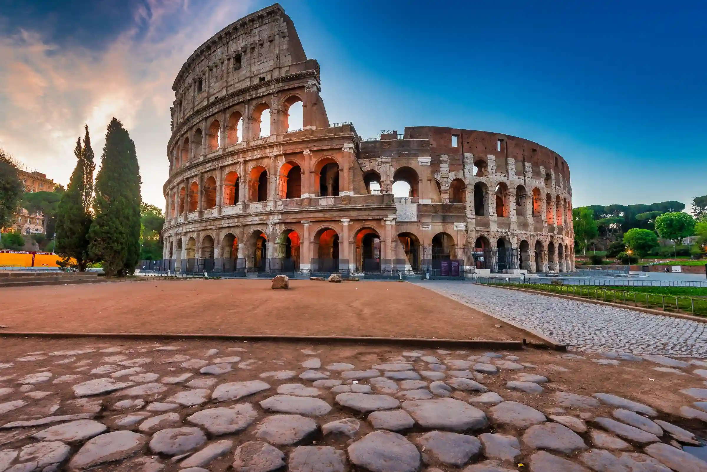 Luxury private chauffeur service in Rome — Colosseum at sunset