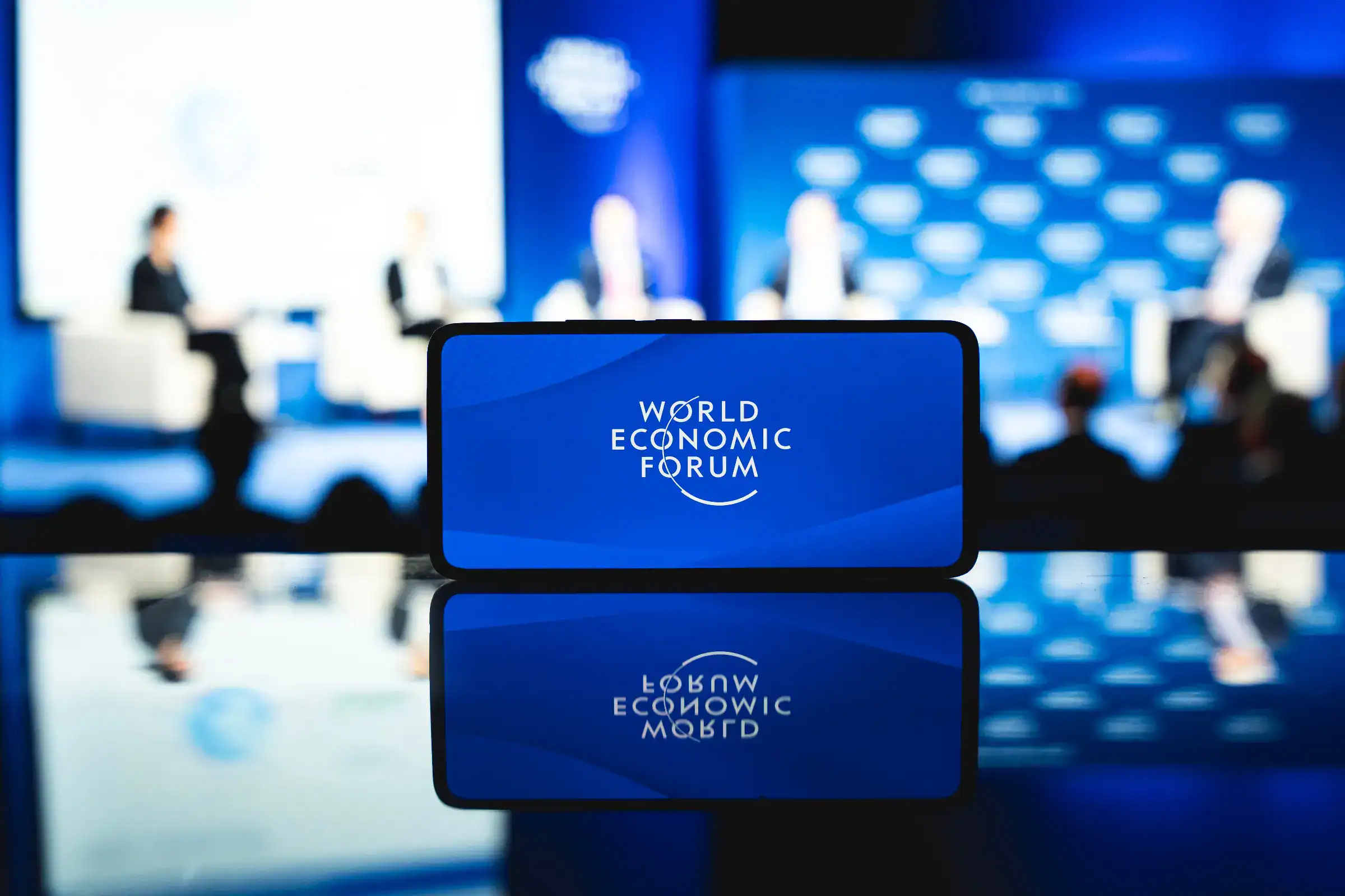 World Economic Forum WEF Davos event logo on screen
