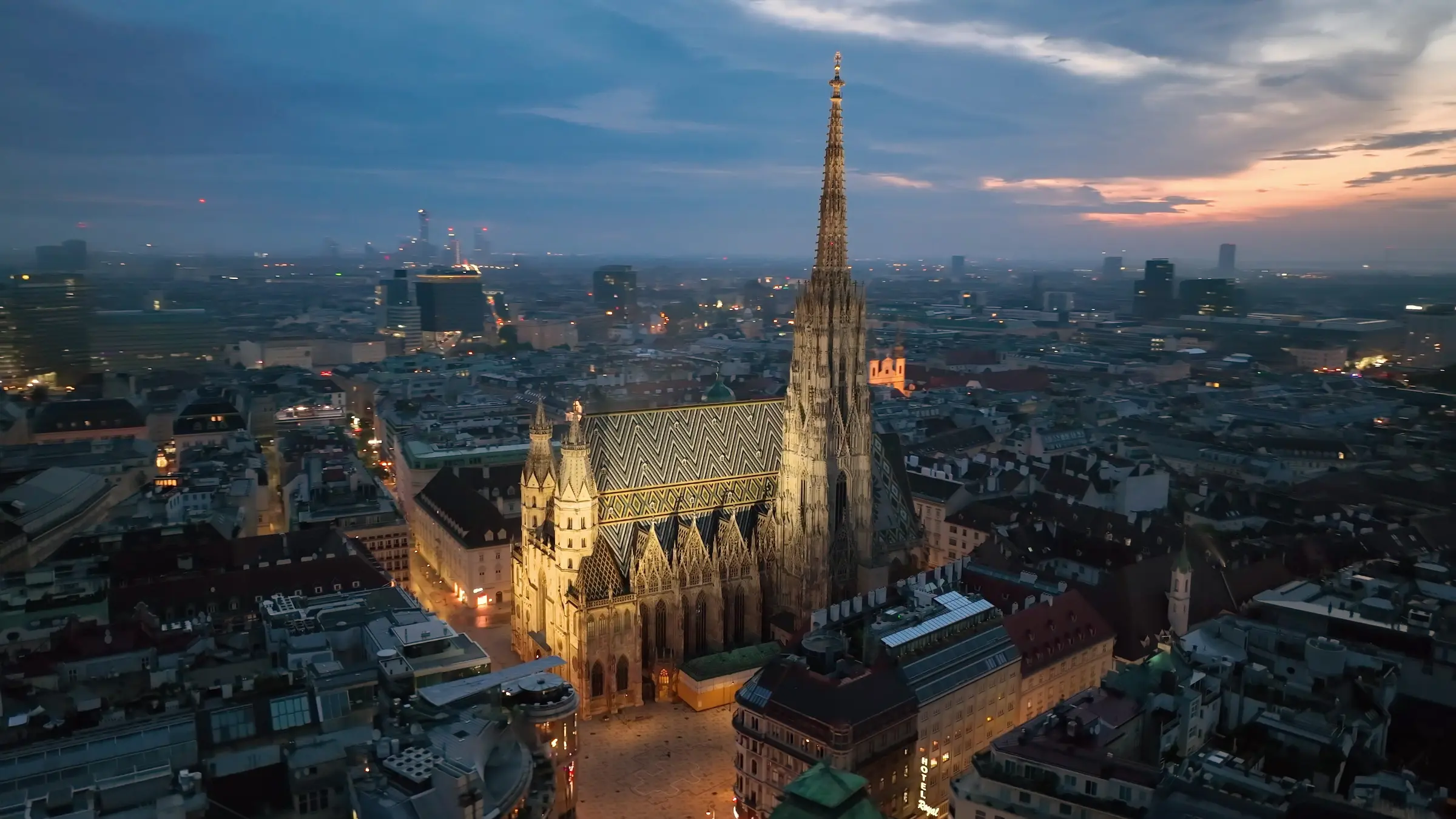 Luxury private chauffeur service in Vienna — Stephansdom aerial view at sunset
